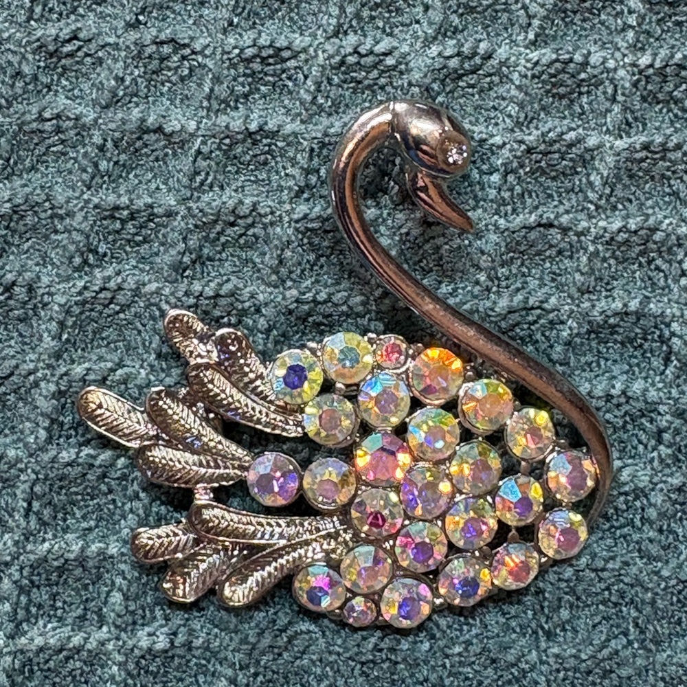Elegant Silver Swan Brooch with Iridescent Accents